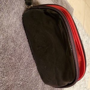 Black patent/vinyl cosmetic case/wristlet